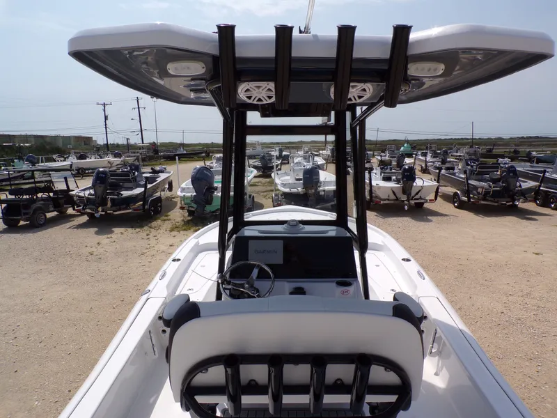 Slide: The Image of 2026 Tidewater 2210 Carolina Bay boat in a parking lot. - 14