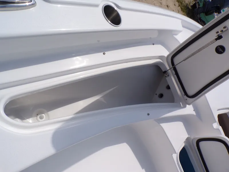 Slide: The Image of Open storage compartment in 2026 Tidewater 2210 Carolina Bay boat. - 28