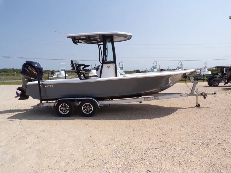 Slide: The Image of 2026 Tidewater 2210 Carolina Bay boat on trailer. - 8