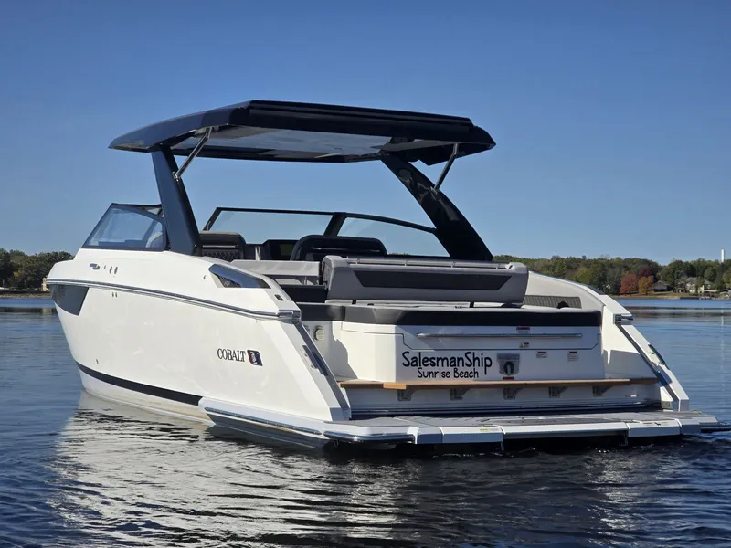 Slide: The Image of Cobalt R35 2025 motorboat on calm water. - 6