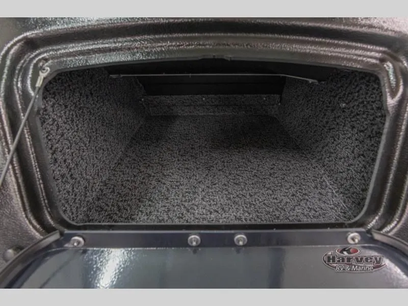 Slide: The Image of Interior of 2026 Explorer Sport 1800 with carpeted flooring. - 15