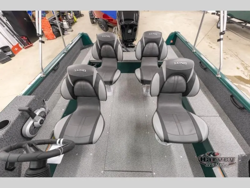 Slide: The Image of Interior of 2026 Explorer Sport 1800 boat with four gray seats. - 22