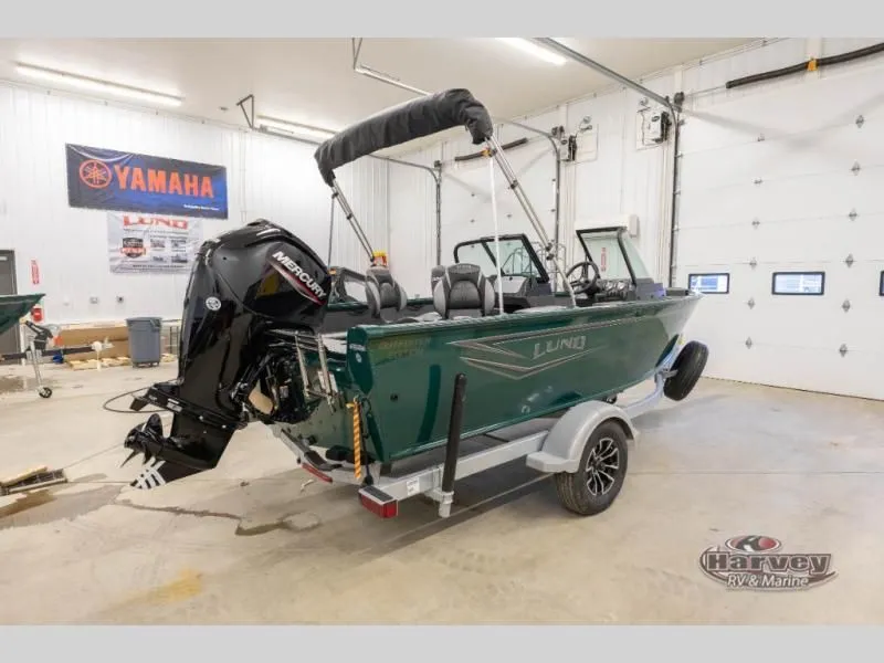 Slide: The Image of Green Explorer Sport 1800 boat from 2026 in a workshop. - 3