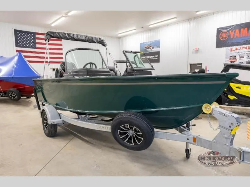 Slide: The Image of 2026 Explorer Sport 1800 boat in a showroom. - 8