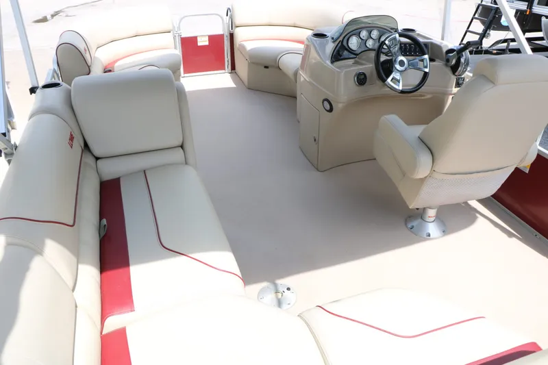 Slide: The Image of Interior of a 2016 Lowe SS190 pontoon boat with beige seating. - 23