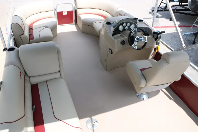 Slide: The Image of Interior of a 2016 Lowe SS190 pontoon boat with beige seating. - 27
