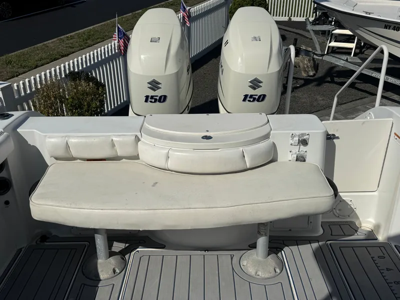 Slide: The Image of 2004 Seaswirl Striper 2601 boat with Suzuki 150 engines. - 16