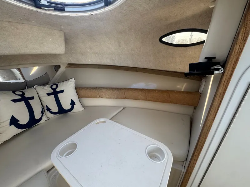 Slide: The Image of Interior of 2004 Seaswirl Striper 2601 with anchor pillows. - 6