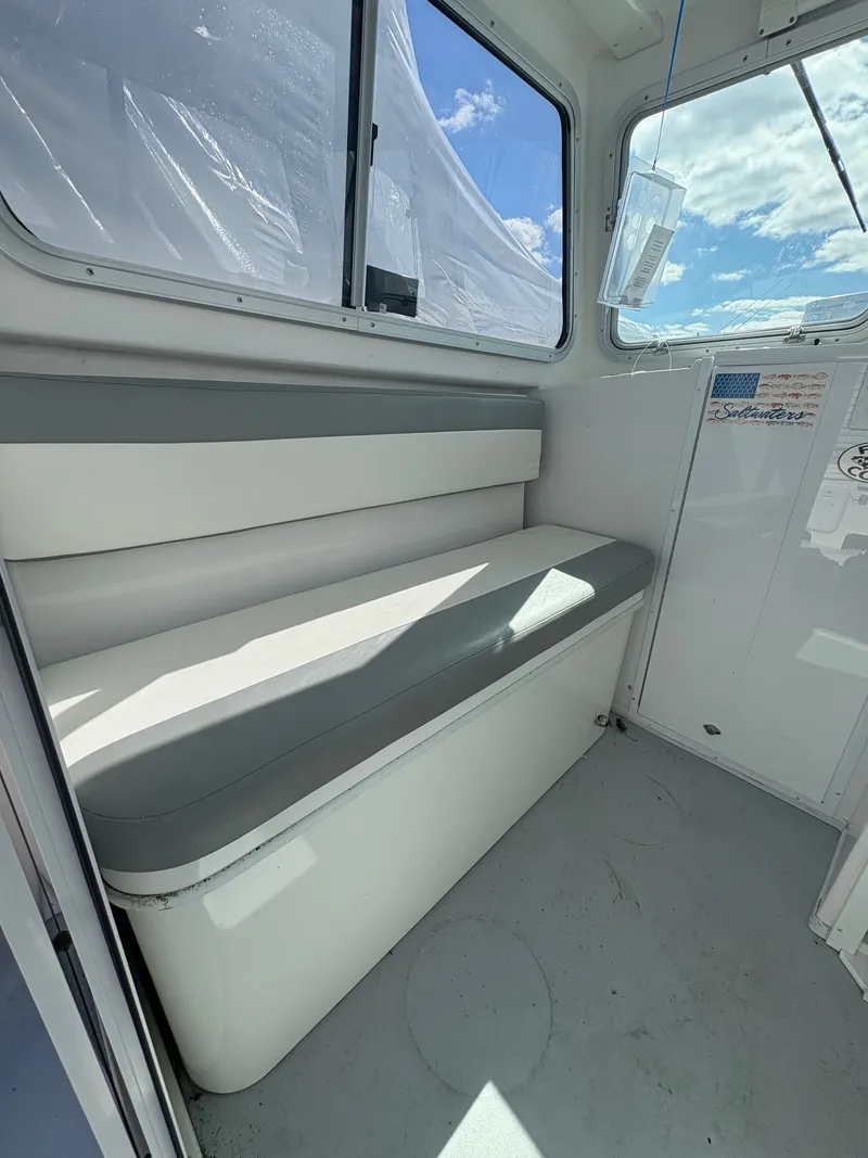 Slide: The Image of Interior of 2019 Steiger Craft 23 Chesapeke with gray seating. - 5