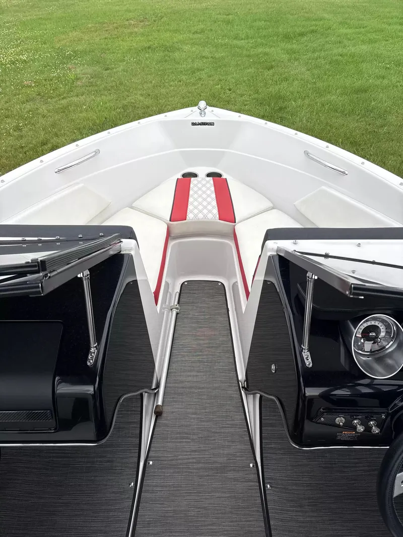 Slide: The Image of The image shows the cockpit of a 2019 Glastron GTS185 boat with red and white accents. - 5