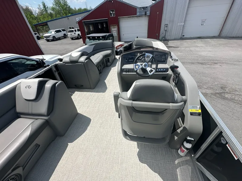 Slide: The Image of Interior view of a 2022 Avalon LSZ Cruise pontoon boat. - 12
