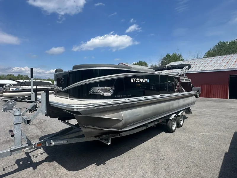 Slide: The Image of 2022 Avalon LSZ Cruise pontoon boat on trailer. - 7