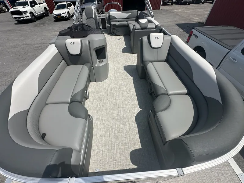 Slide: The Image of 2022 Avalon LSZ Cruise pontoon boat with gray seating benches. - 8