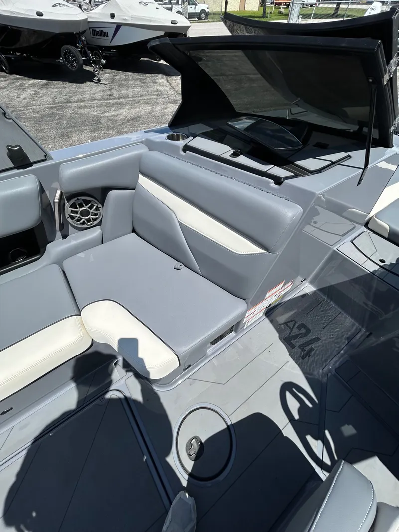 Slide: The Image of Interior of Axis A24 boat, gray upholstery, 2023 model. - 12