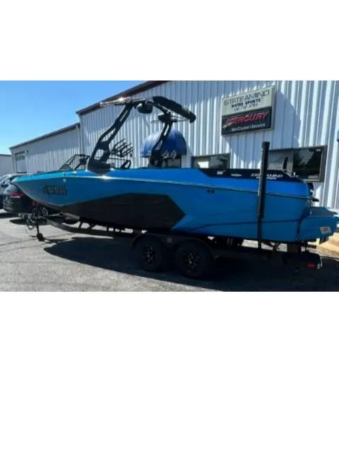 The Image of 2026 Axis A245 boat on trailer outside building. - 1
