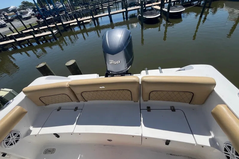 Slide: The Image of 2021 Sportsman Heritage 231 Center Console boat with Yamaha 250 engine at dock. - 4