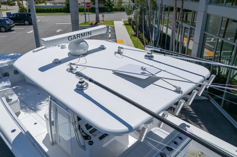 Slide: The Image of 2024 Contender 35 ST boat with Garmin radar, sleek design, and modern features. - 21