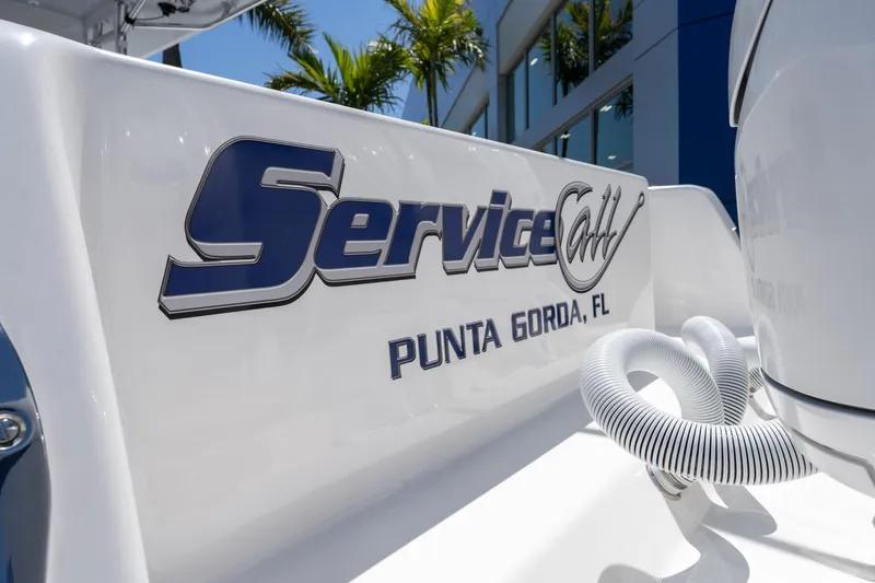 Slide: The Image of 2024 Contender 35 ST boat with "Service Call" branding in Punta Gorda, FL. - 31