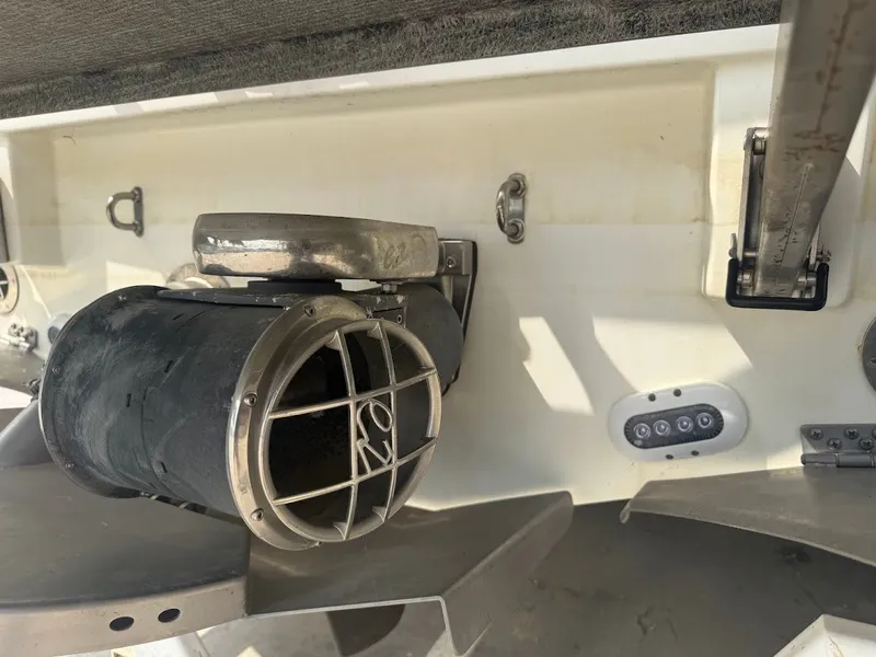 Slide: The Image of Rear view of a 2019 Centurion Ri257 boat with exhaust system. - 16