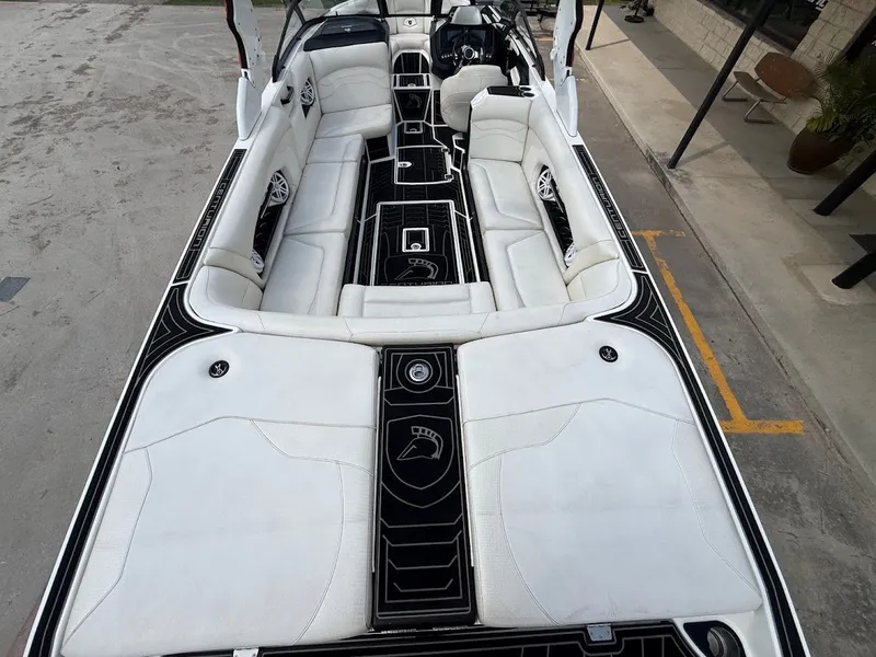 Slide: The Image of Interior of a 2019 Centurion Ri257 boat with white seating. - 21