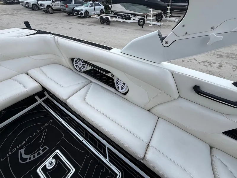 Slide: The Image of Interior of a 2019 Centurion Ri257 boat with white seating. - 25