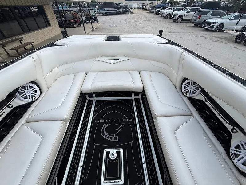 Slide: The Image of Interior of a 2019 Centurion Ri257 boat with white seating. - 26