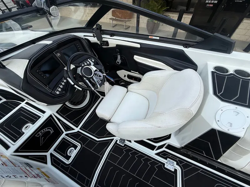 Slide: The Image of Interior of a 2019 Centurion Ri257 boat with modern cockpit. - 28