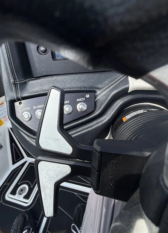 Slide: The Image of Close-up of the control area in a 2019 Centurion Ri257 boat. - 33