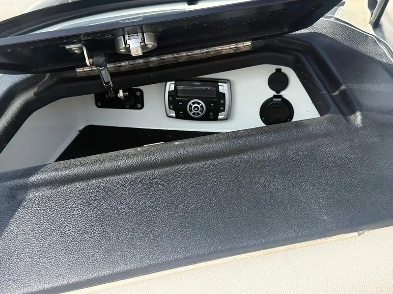 Slide: The Image of 2019 Centurion Ri257 dashboard with controls and ports. - 36