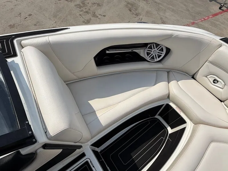 Slide: The Image of Interior of a 2019 Centurion Ri257 boat with white leather seating. - 38