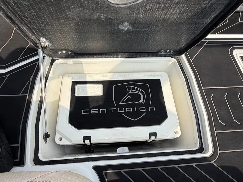 Slide: The Image of Centurion Ri257 2019 boat cooler with logo in storage compartment. - 42