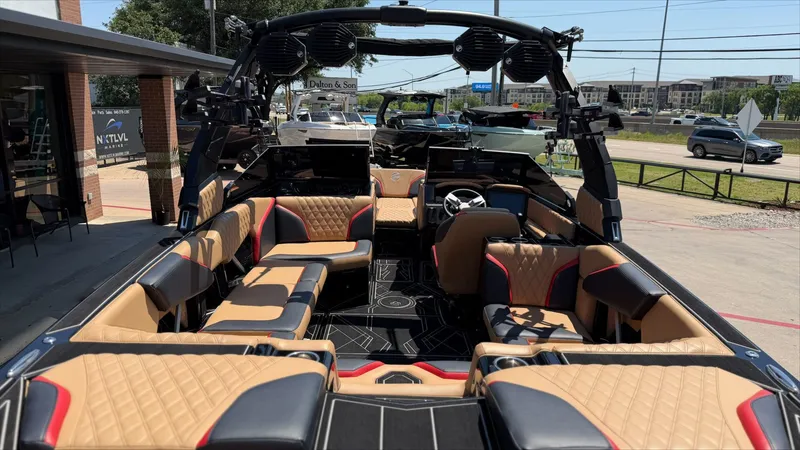 Slide: The Image of Interior view of 2024 Tigé 24RZX boat with luxurious seating. - 10