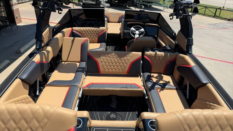 Slide: The Image of 2024 Tigé 24RZX interior with luxurious upholstery. - 12