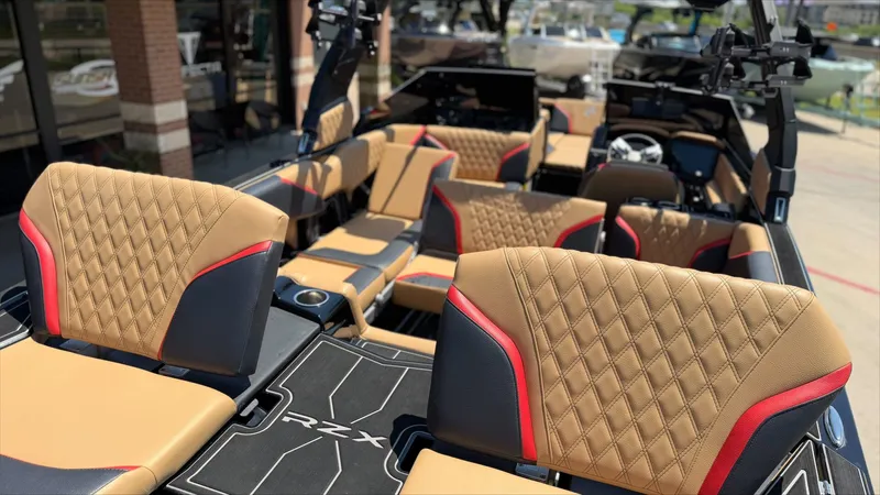 Slide: The Image of Interior of 2024 Tigé 24RZX with luxurious seating. - 13