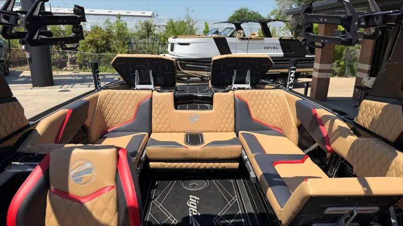 Slide: The Image of Interior of 2024 Tigé 24RZX with luxurious seating. - 14