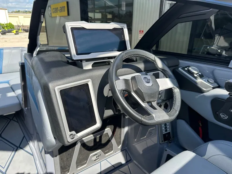 Slide: The Image of 2024 Malibu M242 interior with modern control panel. - 21