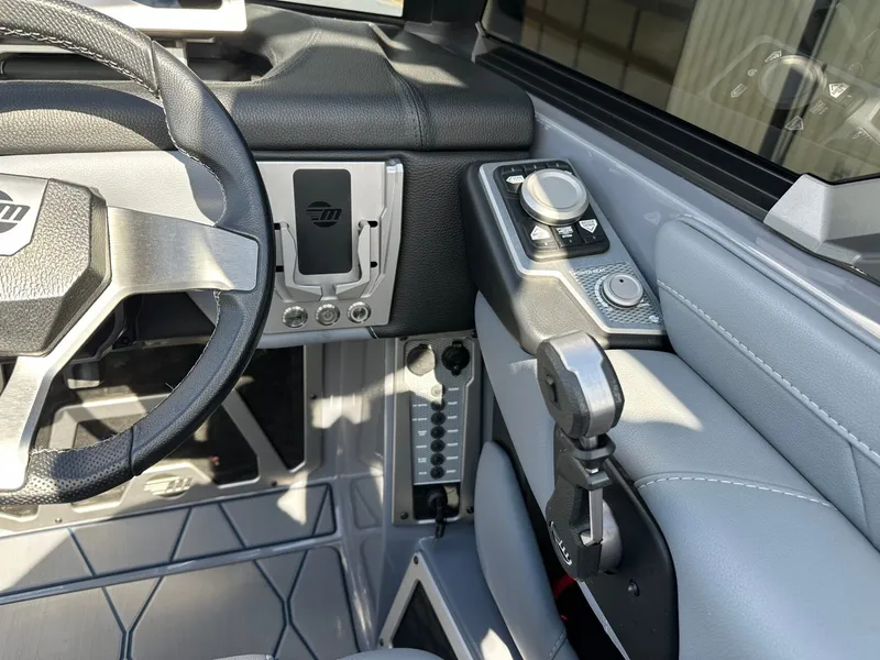 Slide: The Image of Interior of 2024 Malibu M242 with steering wheel and control console. - 23