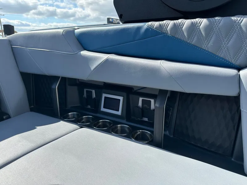 Slide: The Image of 2024 Malibu M242 interior with blue and gray upholstery. - 29