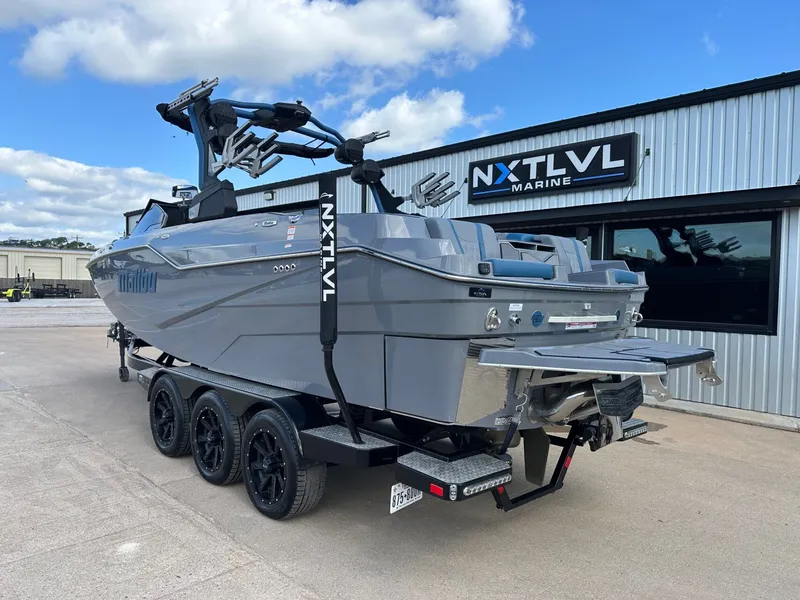 Slide: The Image of 2024 Malibu M242 boat at NXT LVL Marine. - 3