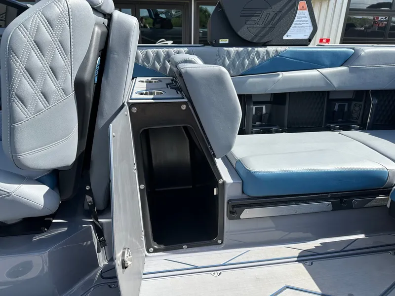 Slide: The Image of Interior of 2024 Malibu M242 featuring storage and seating. - 34