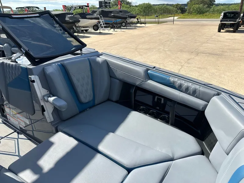 Slide: The Image of Interior of 2024 Malibu M242 boat with luxurious seating. - 42