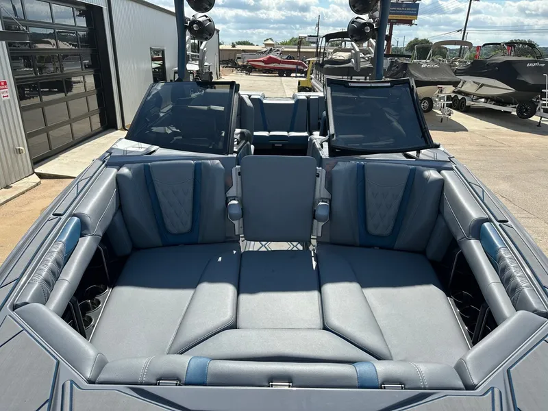 Slide: The Image of Interior of 2024 Malibu M242 boat with luxurious seating. - 44
