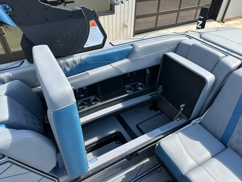 Slide: The Image of Interior of 2024 Malibu M242 with blue and gray seating. - 45