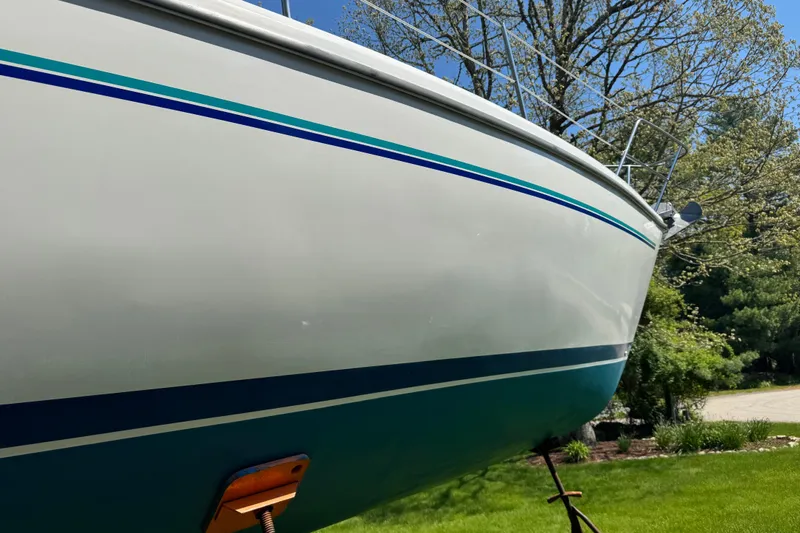 Slide: The Image of Catalina 36 MkII sailboat from 1996 on display, showcasing sleek hull design. - 12