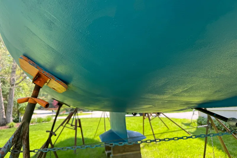 Slide: The Image of Bottom view of a 1996 Catalina 36 MkII sailboat on stands, showcasing its hull. - 21