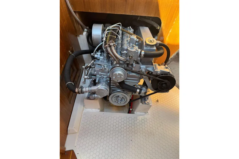 Slide: The Image of Engine of a 1996 Catalina 36 MkII sailboat, showcasing mechanical components. - 29