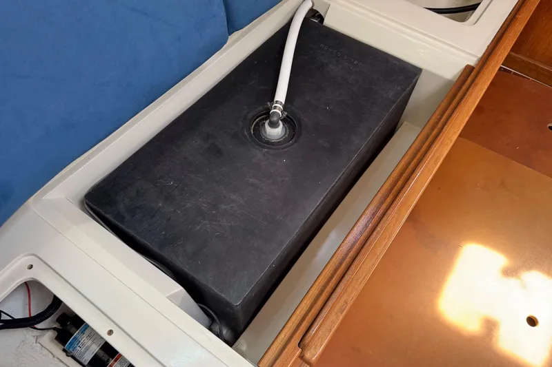 Slide: The Image of Black water tank in a 1996 Catalina 36 MkII sailboat interior. - 48