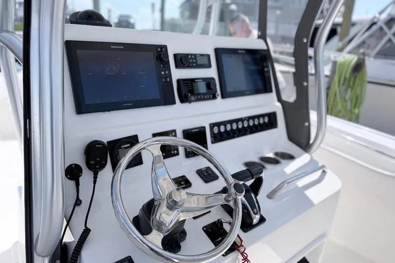 Slide: The Image of Helm of 2018 Cape Horn 31 T boat with modern navigation equipment and controls. - 15