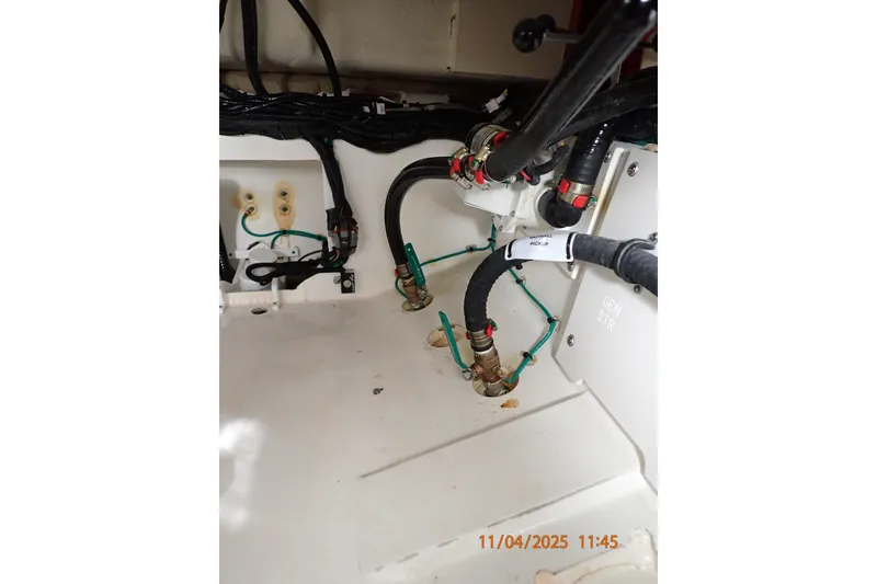 Slide: The Image of 2023 Pursuit S 328 Sport boat interior wiring and plumbing details. - 12