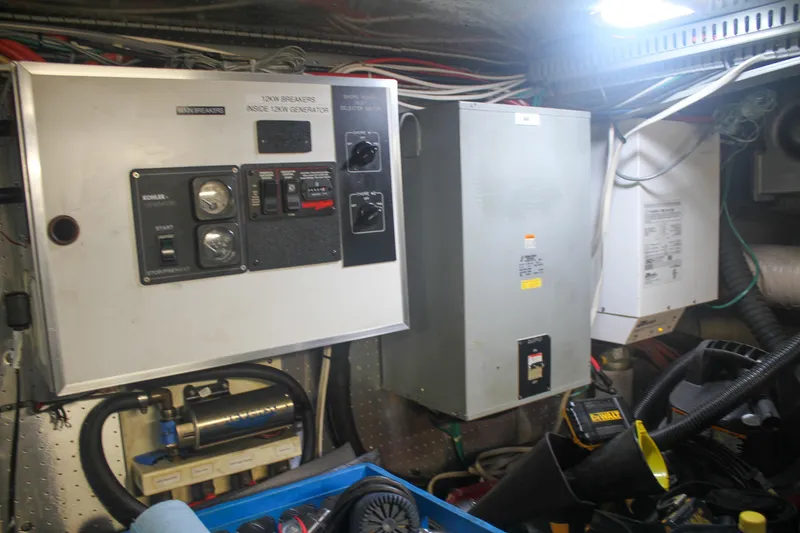 Slide: The Image of Electrical control panel in a 1999 Grand Alaskan Pilothouse engine room. - 143